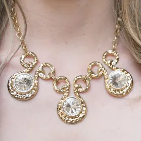 Hypnotized Gold and White Gem Statement Necklace